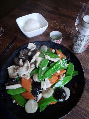 Chicken, snow peas, carrots and shitake mushrooms with white rice.