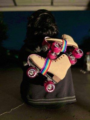 Our haul of the day! Boardwalk skates in tan, stock Boardwalk wheels, leather toe guards and a rainbow Moxi skate leash.