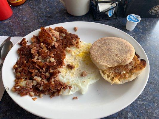 1 egg + corn beef hash (extra well done) with English muffin.