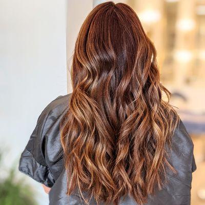 Golden blonde balayage on red hair