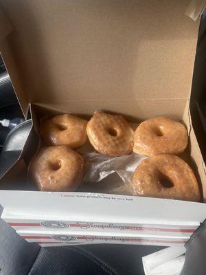 6 pack of donuts minus one that I'm eating!