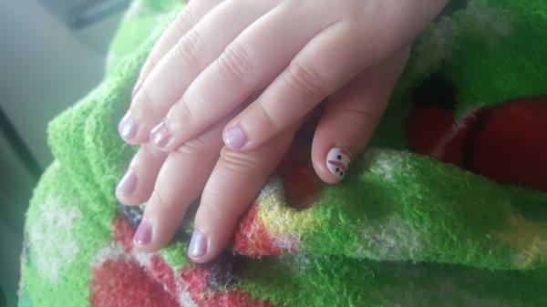 Unicorn on her thumb nail