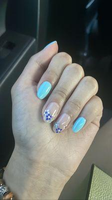 Blue polish with simple and cute white and blue flowers