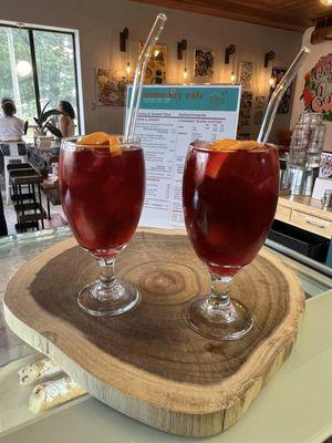 Quench your thirst with the vibrant flavors of our Iced Hibiscus Sun Tea, a delightful drink that offers a refreshing escape with every sip.