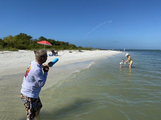 Water fight on the beach