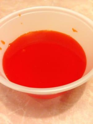 The prepackaged sweet and sour sauce is day-glo orange and nauseatingly sweet