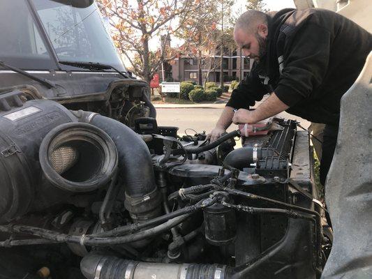 Working on a semi truck.