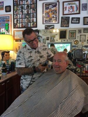 Getting my haircut by Tony the Barber