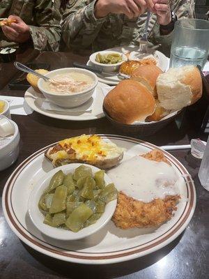 Had the Chicken Fried Chicken, Twice Baked Potato, green beans, rolls and cornbread and my friend had a side of chicken and dumplings.