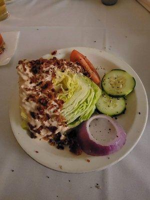 Wedge salad with house made thousand island dressing.  Bacon extra charge.