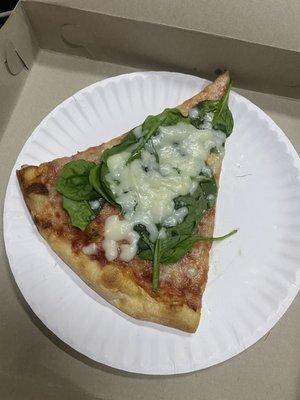 One slice of spinach white specialty slice. Unreal. Like truly unreal