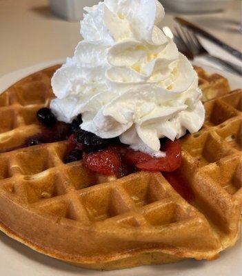 Waffle with strawberries and blueberries.