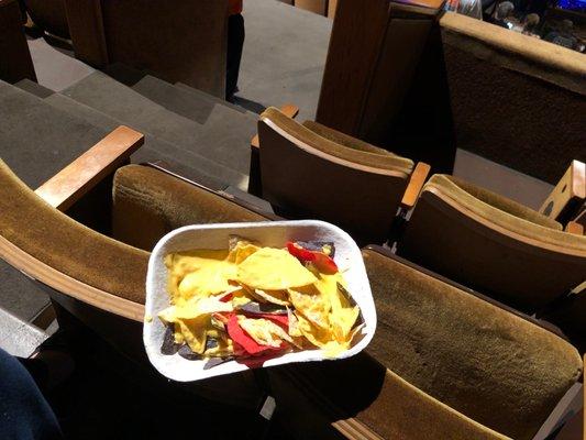 Awful nachos and ancient furniture.