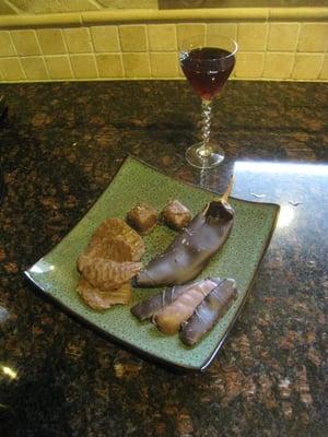 Chocolate covered chili, potato chips, bacon, and salted caramels with a glass of tawny port. Good stuff.