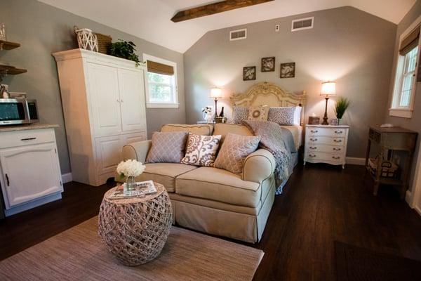 The modern, rustic bedroom suite of Nan's Cottage at Airwell