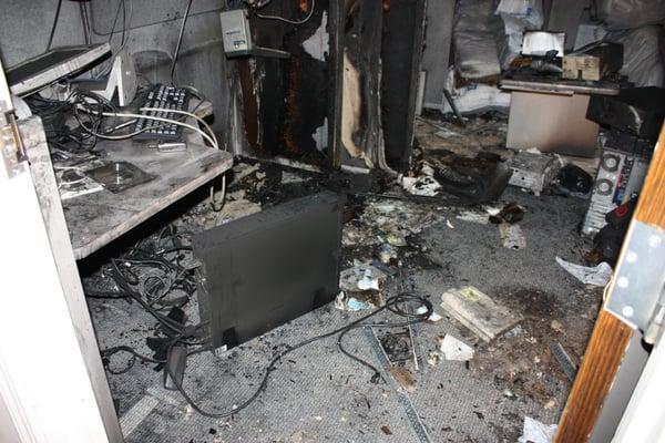 This picture shows how much damage a fire can do. A server room was destroyed within minutes. Please remember to back your data up!