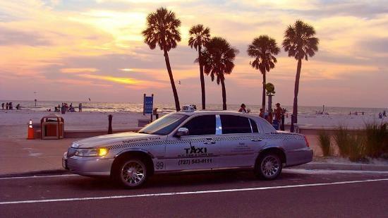 #99  Just 1 of several Lincoln Town Cars with N.Y Cab & Limo Co. This driver was apparently taking a break on Clearwater Beach