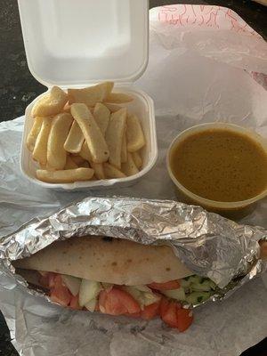 Huge falafel sandwich, fries and mango amba sauce