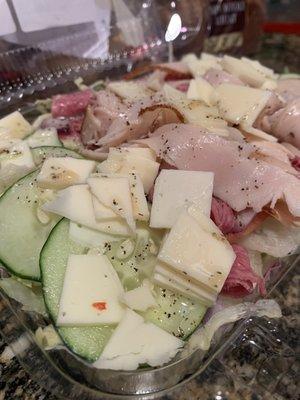 Salad with meat and cheese