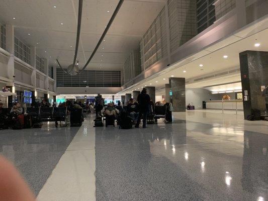 Only half of ALL the people who are waiting for their rental car. The other half are behind me.