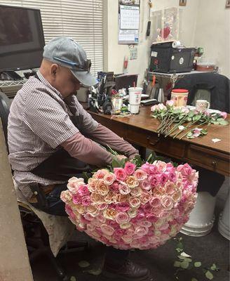 Shop owner working on an arrangement