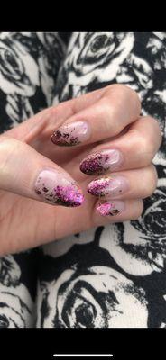 Iridescent foil nail design.