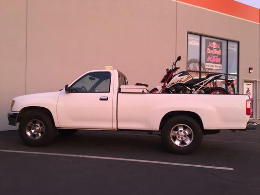 An old truck and a new motorcycle