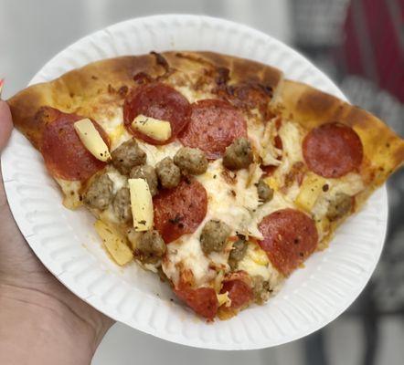 Pizza with pineapple, pepperoni & sausage, average pizza, but keeps you full while you shop!