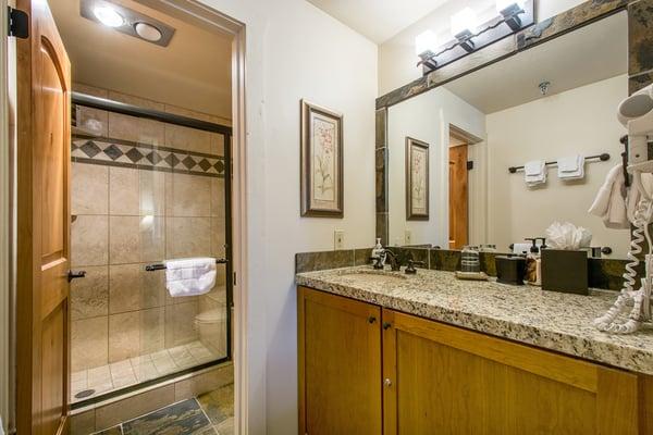 Master Bath with Travertine, Granite & Slate (2BR)