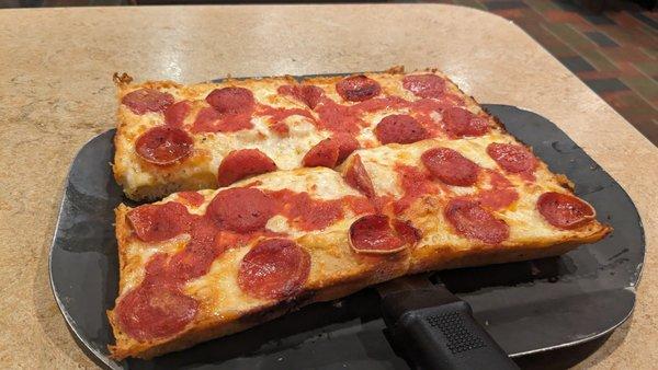 Original Detroit Style Pizza with old world pepperoni and brick cheese.