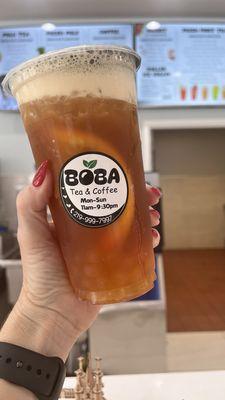 Peach orange lemongrass black tea with passion fruit boba