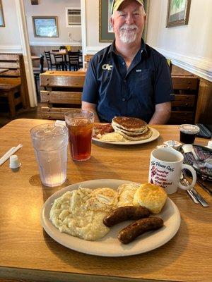 Lite breakfast + county sausage and hungry man breakfast with pancakes + my cute husband.