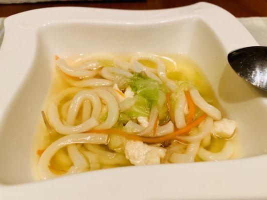 Chicken udon soup with cabbage and carrots