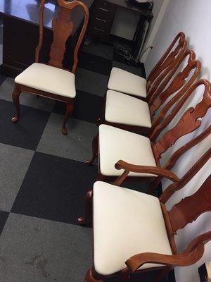 Dining chairs done in leather