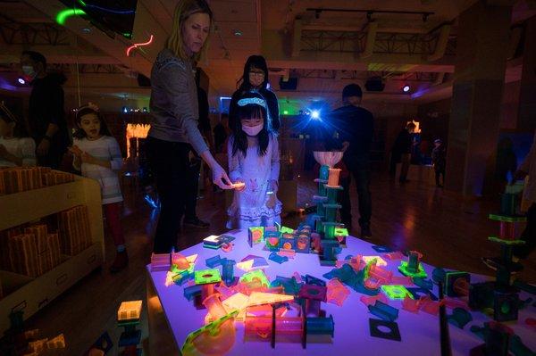 Our Glow in the Dark Room offers a place for building in the dark with blacklights, marble shoots, and more!