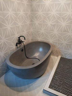 Herringbone bathroom tile, complicated wall tile, glassless shower pan.