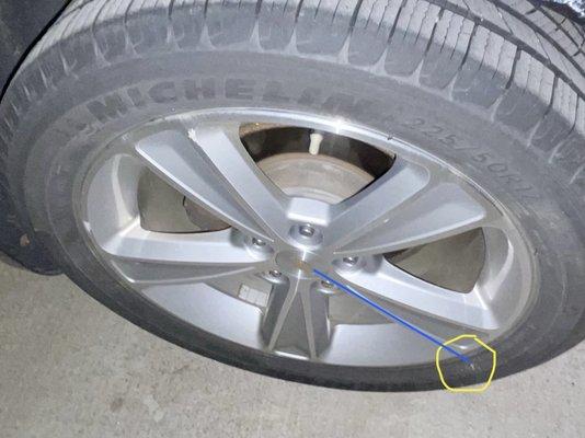 Mark on right rear tire, summer on '22 photo after initial damage in parking garage. Also note, tire size is 225/50R17