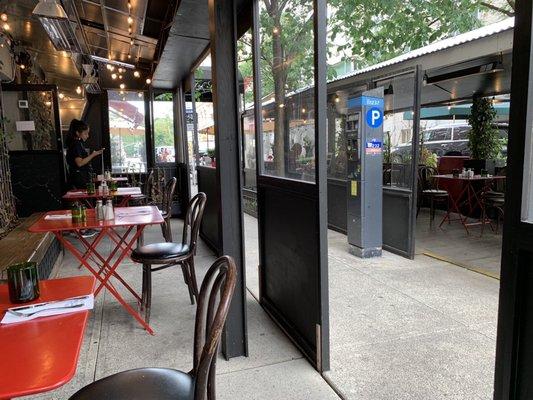 Covered outdoor seating on E 91st St