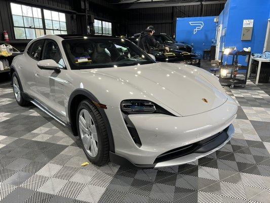 This 2022 Porsche Taycan Cross Turismo received a 2-step paint correction, full body Xpel paint protection film and Ceramic Pro coating