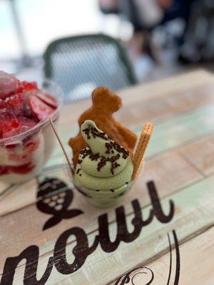 Taiyaki in a cup with matcha ice cream, chocolate sprinkles and wafer