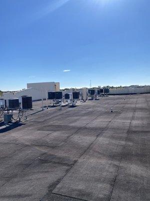 Condo rooftop A/C compressor inspecting.