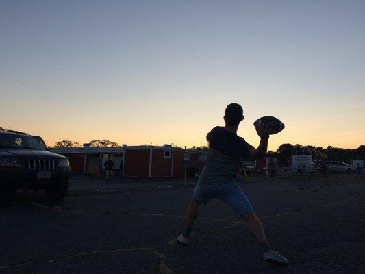 Captured my brothers tossing around the pigskin in the twilight before the movie began