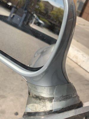 Car wash broke my mirror, in which I used, Flextape, to secure it back on.