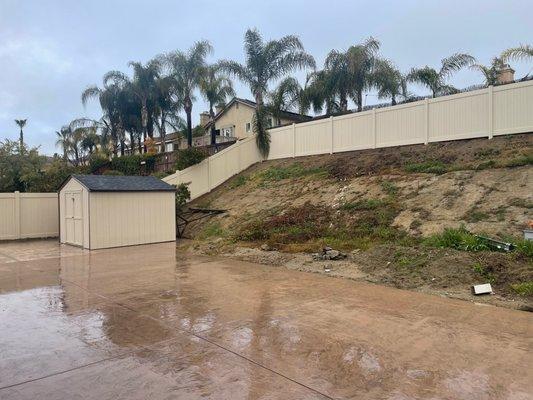 The privacy panels on this vinyl fence provide a safe and secure backyard space for your family to enjoy.