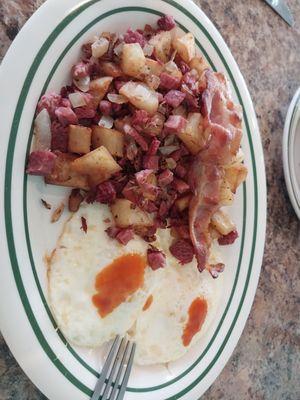 Corn beef hash + slice of bacon + 2 eggs