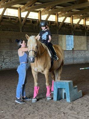 My daughter getting a lesson from Ms.H! She was SO scared of horses when she started coming to Horseplay Ranch but look at her now!!!