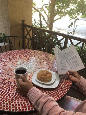 Breakfast and a book on the Serena Sober Living Balcony.