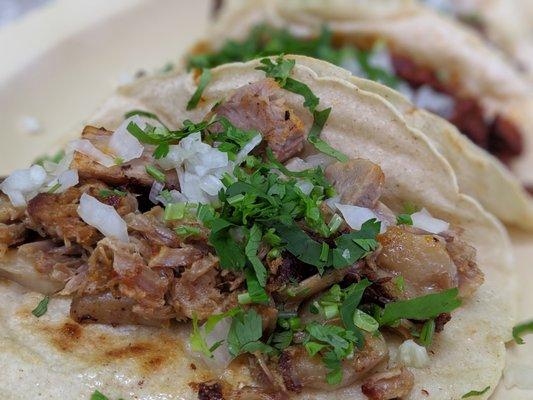 Taco carnitas. $1.99.