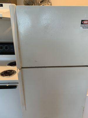 It's hard to tell but the fridge was disgusting. It had rust and grease all over it.