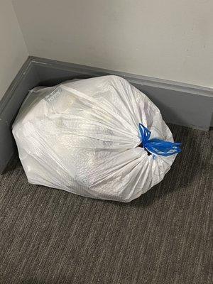 Garbage in hallway. Repeated calls over 6 hours, and nothing. Rats will be here before maintenance.